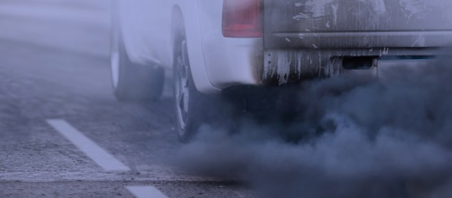 car-with-exhaust-from-tailpipe Extremely dirty truck exhaust