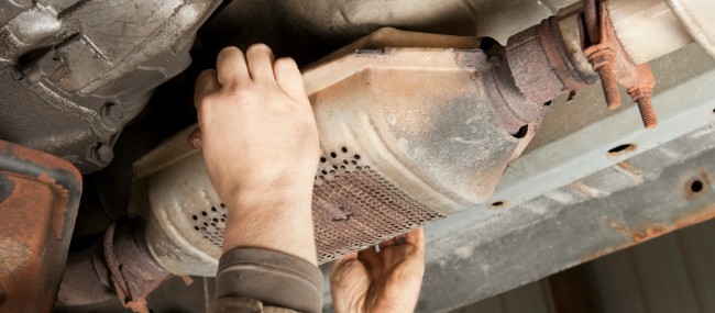 Auto-Technician-Replacing-Catalytic-Converter Auto-Technician-Replacing-Catalytic-Converter