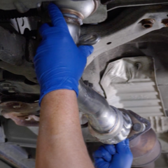 step-9-technician-lining-up-new-catalytic-converter step-9-technician-lining-up-new-catalytic-converter